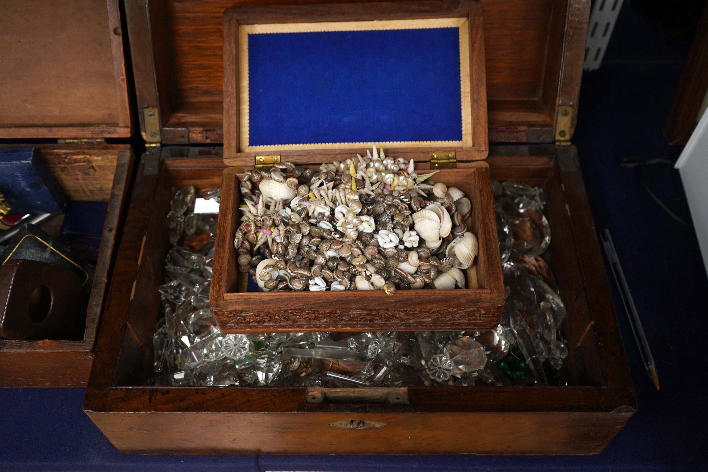 A box of cut glass drops, together with box of gaming counters, a gilt metal cross, an Art Deco ceramic nude figure, two frames, a parker pen, etc.